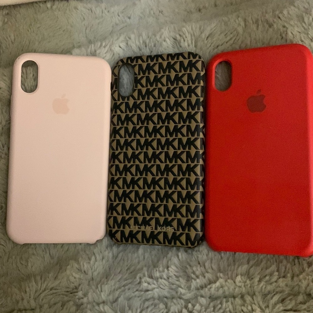 3 XR cases one is michael Kors the other 2 are Apple cases